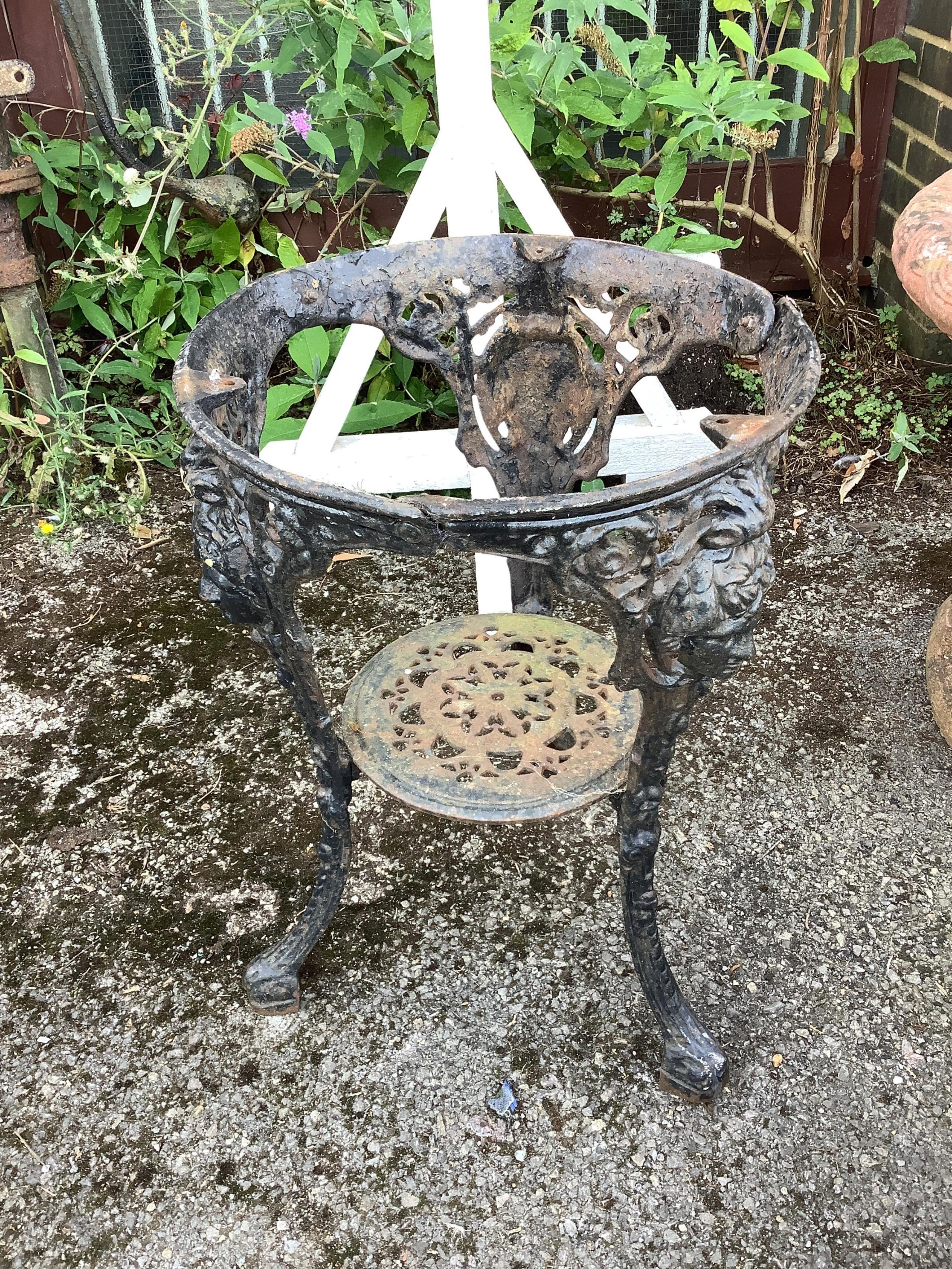 A Victorian circular painted cast iron pub table, with associated top, diameter 62cm, height 71cm. Condition - poor to fair